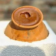 মাটির হাড়িতে খেজুরের গুড়